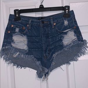 Super distressed denim shorts